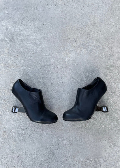 Bottines à talon sculptural United Nude en cuir noir